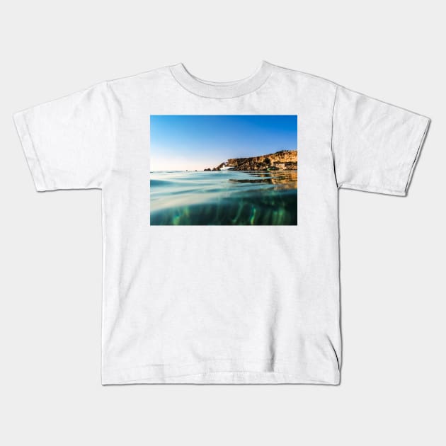 Boat Floats On Crystal Clear Water Kids T-Shirt by Kate-P-